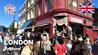 London, England. A walk in Notting Hill: Portobello Road Market on a Saturday morning. 4K
