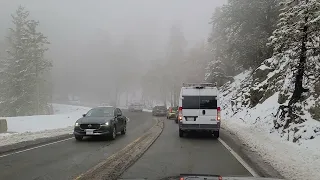 Winter scenery, driving on a snowy Day in Big Bear California