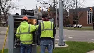 Signs & Signals in Battle Creek - installing a new signal control cabinet