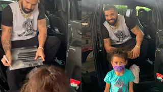 Drake gives young fan an autograph and takes picture with her