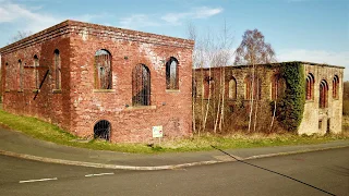 Two ruined winding houses at Plas Power Colliery established in 1875