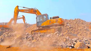 First View of this Pyramid Construction Technique excavator opparator video stone chips