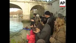 Traditional new year's plunge into river Tiber