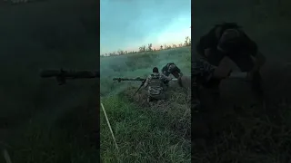 Ukrainian military target Russian positions using the SPG-9 anti-tank grenade launcher.