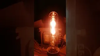 Starting a hot cathode helium spectral lamp