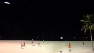 Kites on Copacabana Beach at night