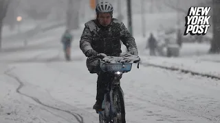 New York City snowstorm prompts challenging commutes for residents