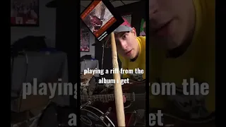 playing a riff from the album i get