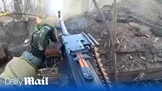Ukraine soldiers fight off Russian attack with heavy gunfire from trench in Kharkiv