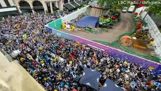 Thousands of Scotland fans take over London's West End, shower rival England supporters with beer