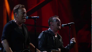 U2 & Bruce Springsteen perform "Still Haven't Found What I'm Looking For" at the 25th Ann. concert.