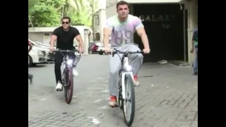 salman khan and brother sohail khan riding a cycle on the street of bandra Mumbai