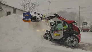 Manitou MT420 and 8' Kage Snowfire Moving Snow