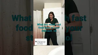 Women shows off her huge belly from eating fast food lol