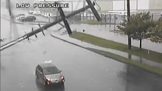 Power pole falls on car near Tukwila