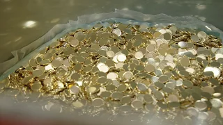 A peek behind the scenes to see how Coloured Two Dollar Coins are made.