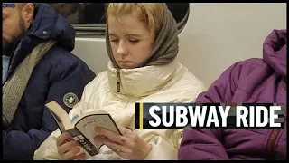 Russia St Petersburg Metro Ride Frunzenskaya Metro Station - People's faces in  subway