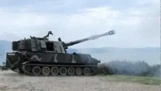 Hellenic Artillery M109A1B firing slideshow.