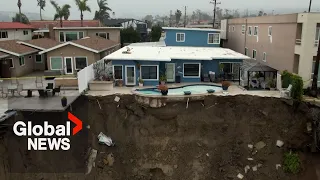 California storms: Pool dangles off cliff after atmospheric river triggers landslide