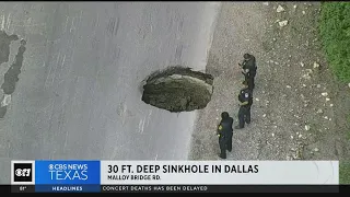 30-foot-deep sinkhole prompts North Texas road blockage