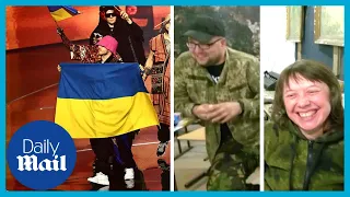 Ukrainian soldiers cheer as Eurovision winner Kalush Orchestra is announced