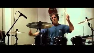 Christian Bale playing drums.