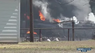 Massive fire erupts after train, 18-wheeler collide in Texas