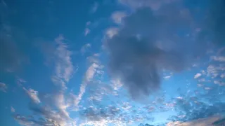 Movement of Beautiful Clouds on the Blue Sky before Sunset