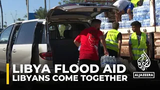 Libya floods: Libyans come together to help those in need