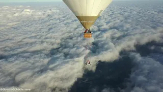 Scooter Stuntman riding his Vespa over the clouds