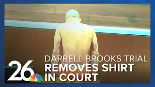 Darrell Brooks takes his shirt off in court