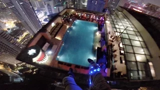 Basejumpers Crashing Rooftop Pool Party - KL Tower 2014