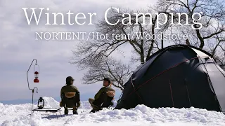 NORTENE / GAMME8 wood-burning stove camp in the snow, winter camp by the lake