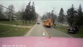 Truck nearly hits school bus filled with kids in Ohio