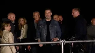 John Travolta attending Grease 40th anniversary screening on the beach in Cannes