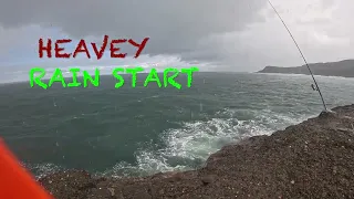 fishing under heavy rain