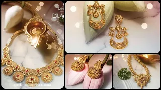 Tanishq divyam collection of gold necklaces and earrings