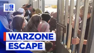 Aussies escape Gaza as Rafah crossing opens | 9 News Australia