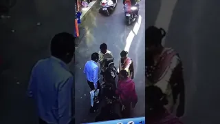 Indian theft taking mobile phone from people pocket