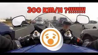crazy russian biker doing 300km/h in traffic!!