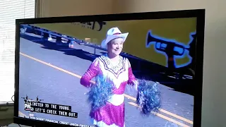 SUN CITY MARCHING POMS AT THE FIESTA BOWL PARADE IN PHX AZ.