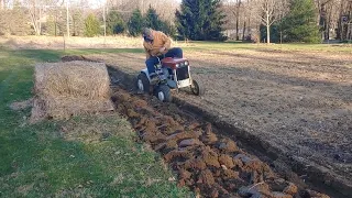 John Deere 140 H3 patio plowing