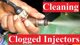 How to clean clogged fuel injectors that are stuck for a long time