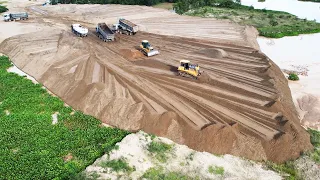 Large Capacity  Sand Filling Up Process Bulldozer Operator Specializing Spreading Sand Into Water