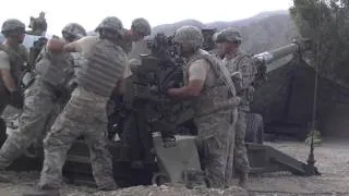 M777 ARTILLERY FIRES DIRECTLY AT TALIBAN POSITION