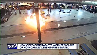New video contradicts worker's claim of how car dealership fire started