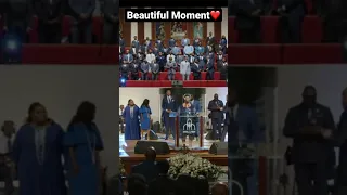 Tiunna Lemons, the widow of Kevin Lemons, sing “Time of My Life” at his funeral