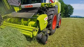 Claas silage chopper and crew putting up first cutting alfalfa haylage.