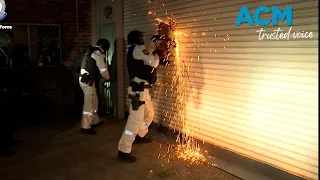 Police take chainsaw to Mongols bikie clubhouse in raid