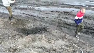 porsche cayenne in a russian mud off road